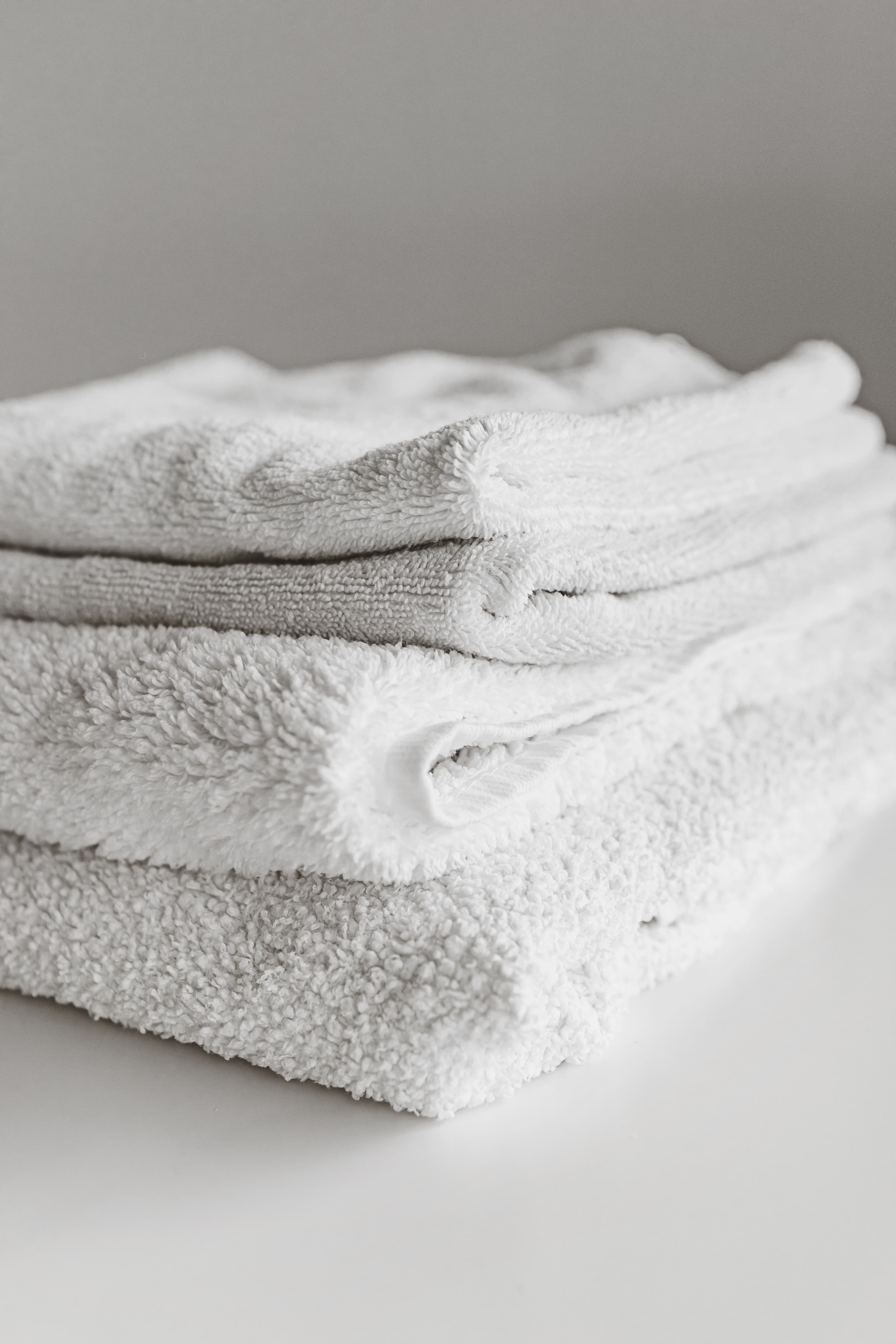 Fresh hotel and hospital linen arranged for commercial laundry