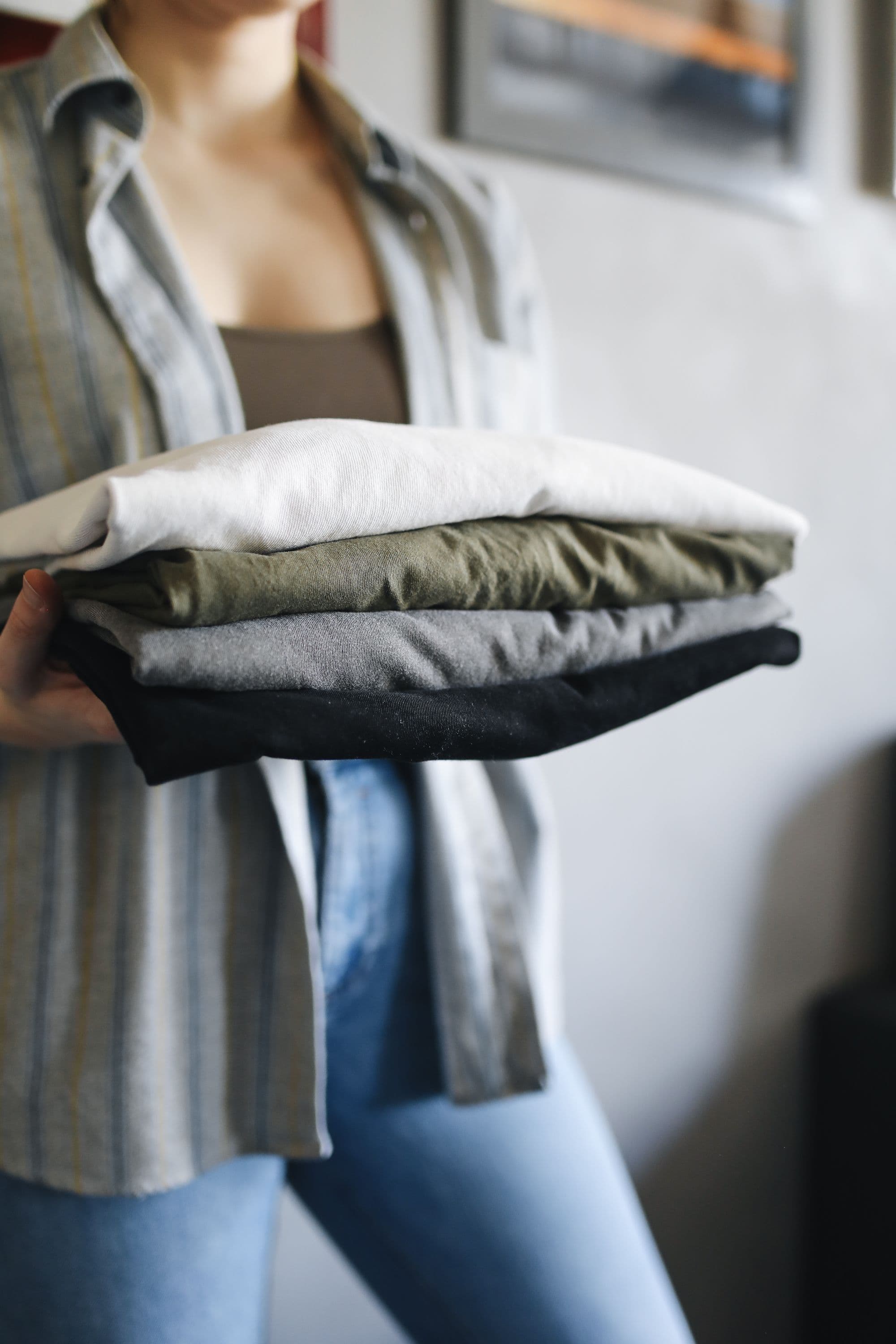 A stack of freshly folded everyday clothes